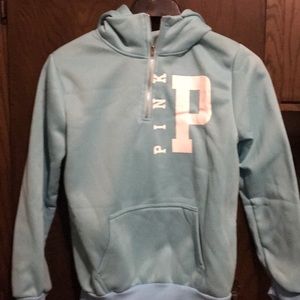 Never worn...Light blue 3/4 zip up hoodie.